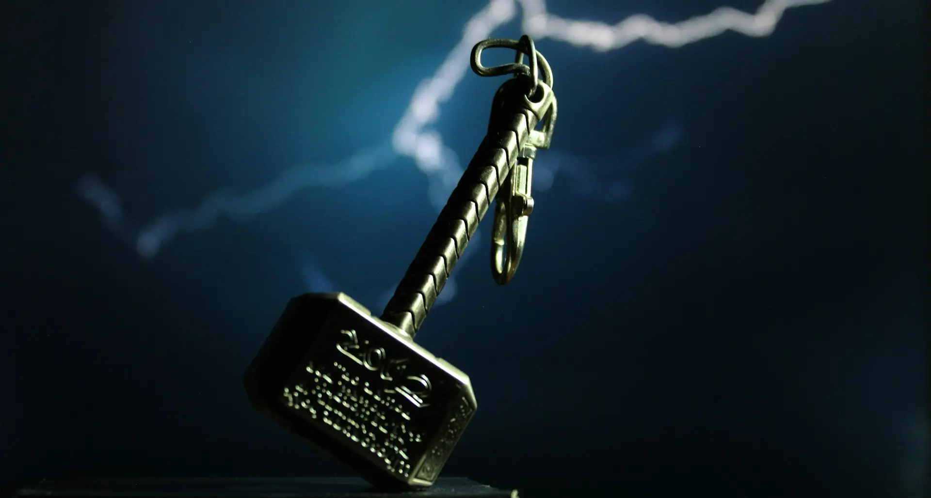 silver skeleton key with black and silver key